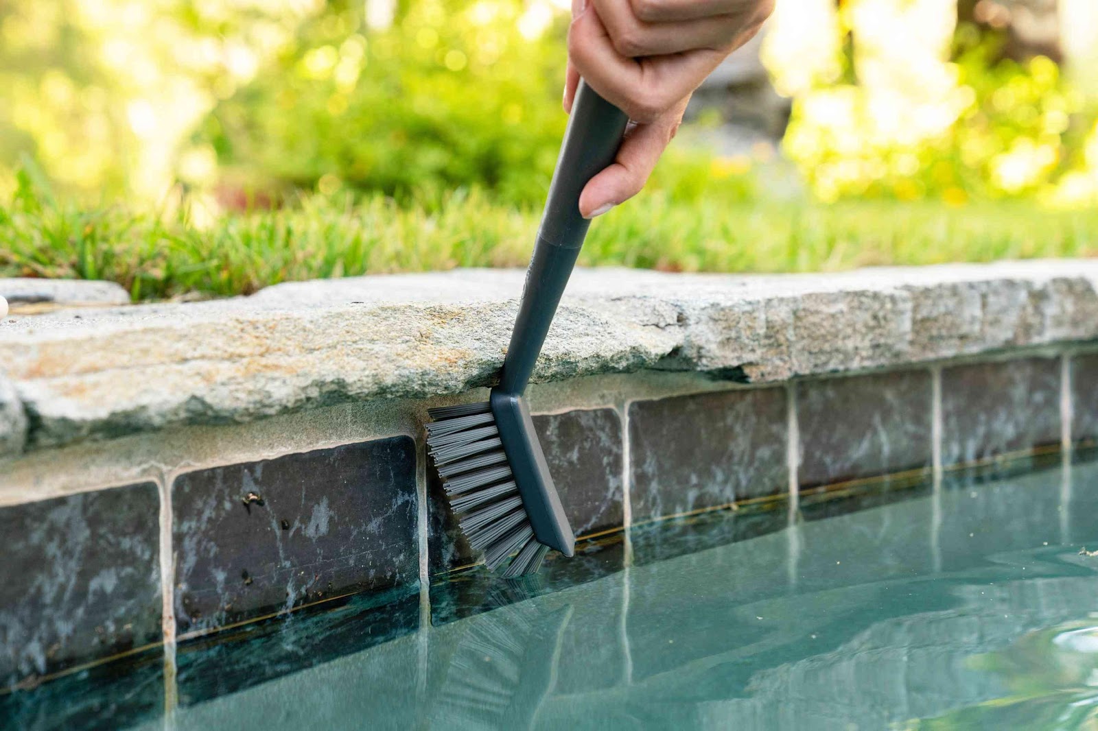 How to Clean Pool Tile at the Waterline
